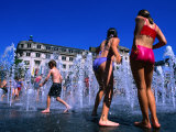 Children Playing in Piccadilly Gardens Waterjets  Manchester  England