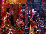 Oriental Figures at Chinese New Year's Eve Ceremony  San Francisco  California  USA