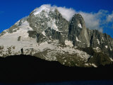 Walker Silhouetted Against Aiguille Verte on Tour Du Mont Blanc  Chamonix Valley  France