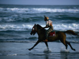 Boy Riding Pony on Beach Parangtritis  Central Java  Indonesia