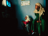 Muslim Girls Relax Watching Television  Indonesia