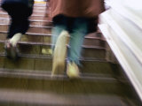 Pedestrians Walking Up Steps Out of Subway Station  Blur  New York City  USA