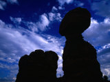 Hiker Dwarfed by Balanced Rock  Arches National Park  Utah  USA