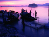 Sunset Over Fishermen on Banks of Brahmaputra River  Guwahati  Assam  India
