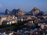 City Buildings and Limestone Karst Peaks in the Li River  Guilin  Guangxi  China