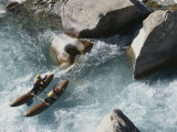 Raftsmen on a Twin Pontoon Cataraft Tackle Oygaing River Rapids