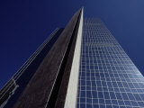 The Desert Sky Reflected in the Soaring Glass Walls of a 40-Story Building