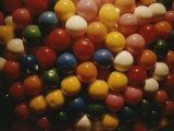 A Colorful Close View of Gumballs Behind Glass