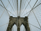 Cables Form an Abstract Web Around the Points of Two of the Bridges Archways