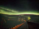The Aurora Borealis Streaks Across the Evening Sky