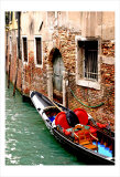 Gondola by a Brick Wall  Venice