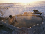 A Hiker Enjoys a Dip in a Hot Springs in Long Valley