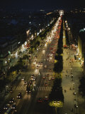 An Elevated View of a Traffic-Filled Paris Street at Night