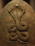 The Image of a King Cobra Carved on the Surface of a Stone