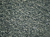 Pebbles Seen Through Shallow Rippling Water