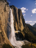 A Spectacular View of a Waterfall in the Midst of Some Cliffs