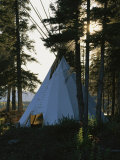 A Tepee is Built on the Edge of Cli Lake