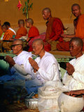 Nuns Praying at Pha That Luang Temple During the Full Moon Temple Festival  Vientiane  Laos
