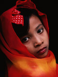 A Portrait of a Muslim Girl with Her Face Framed by a Colourful Scarf  Indonesia