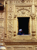 Sikh Pilgrim in Open Window of Hari Mandir in Golden Temple Complex  Amritsar  Punjab  India