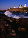 Surf Crashing on York Beach with Nubble Lighthouse in Background  Cape Neddick  USA