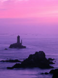 Silhouette of Lighthouse Against Pink Sky at Sunset  Pointe Du Raz  Brittany  France