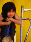 Portrait of Lao Girl at Entrance to Wat St Muang  Vientiane  Vientiane Prefecture  Laos