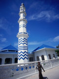 Woman Walking Past Minaret Eydhafushi  South Maalhosmadulu Atoll  Baa  Maldives