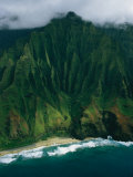 Aerial View of a Beach at the Base of a Lush South Pacific Mountain