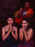 Monk Blessing Two Women at Angkor Wat  Angkor  Cambodia