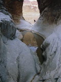 Hiker Exploring the Silver Grotto at Mile 29 of the National Canyon