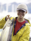 Teen Girl Holding a Fish