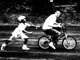 Teen Boy Stealing Younger Boy's Bicycle
