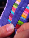 Hands Working on Quilt