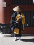 Buddhist Monk Collecting Alms and Praying  Asakusa Kannon Temple  Tokyo  Honshu  Japan