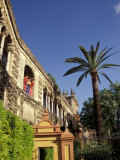 Young Women in Flamenco Dresses Under Arch in the Alcazar  Cordoba  Spain