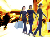 Blurred Silhouette of Woman Swinging Shopping Bags in Busy City Scene