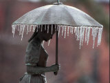 Ice Hangs from the Girl with Umbrella Fountain