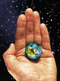 Hand Holding the World