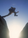 Business Man Leaping Across