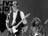 Francis Rossi Lead Singer with Pop Group Status Quo Singing on Stage at Live Aid Contest