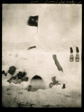 Commander Pearys Igloo is Marked by an American Flag on Top and Surrounded by Scattered Supplies