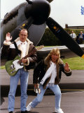 Status Quo Members Francis Rossi and Rick Parfitt Posing by a Spitfire Aircraft in Northolt