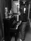 Sir Elton John in His New Mansion in Camberley  Surrey  Playing His Upright Piano  June 1974