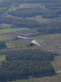 Hang-Glider Soars Over the Countryside