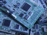 Computer Boards and Chips Lie in a Pile