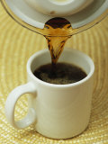 Coffee is Poured into a Mug