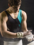 Male Gymnast Putting Chalk on his Hands  Bainbridge Island  Washington State  USA
