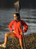 Woman Standing with Oars Leaning Against Her Shoulder  Bainbridge Island  Washington State  USA
