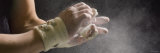 Male Gymnast Putting Chalk on his Hands  Bainbridge Island  Washington State  USA